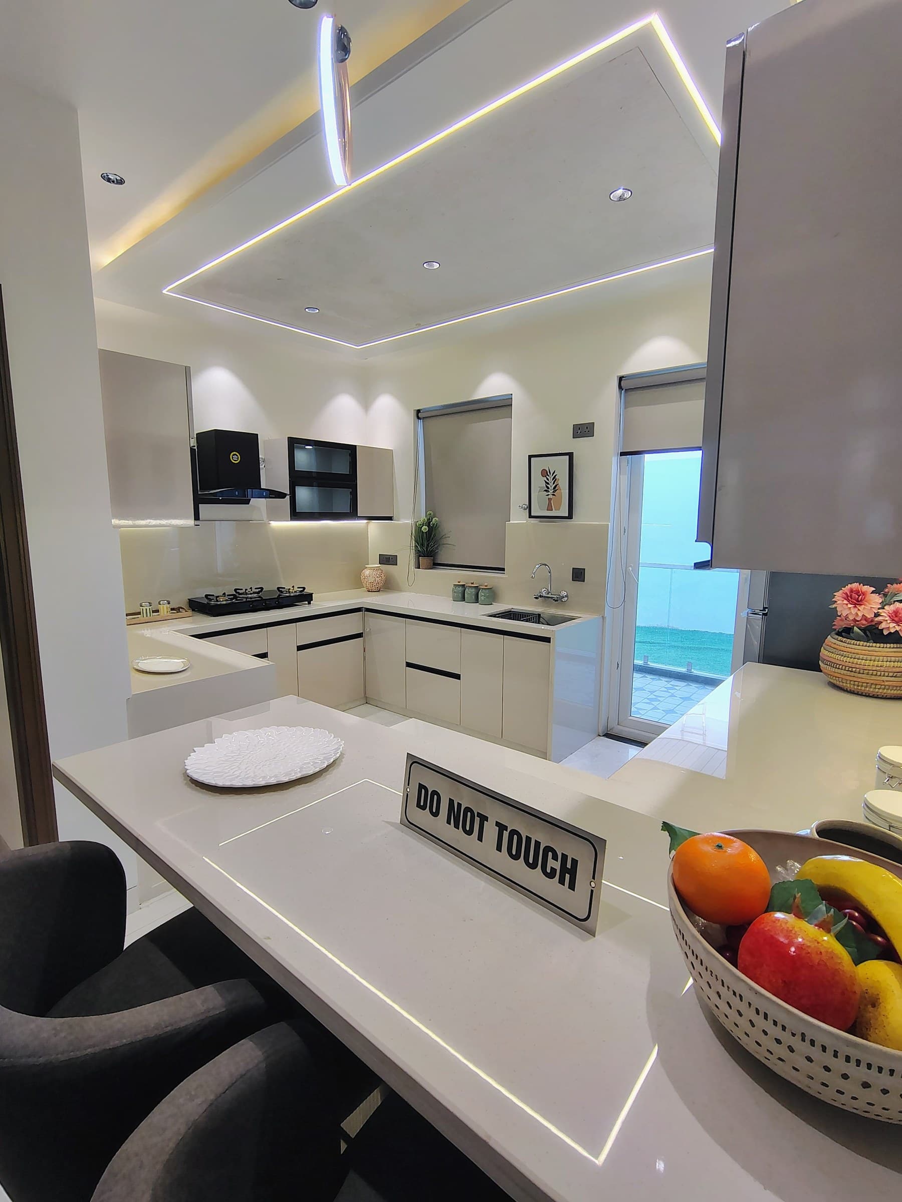 Spectrum 21 model apartment kitchen and dining island